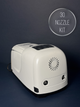 A white high pressure misting pump (1000 PSI) on a navy blue backdrop with the words "30 nozzle kit" in the upper corner