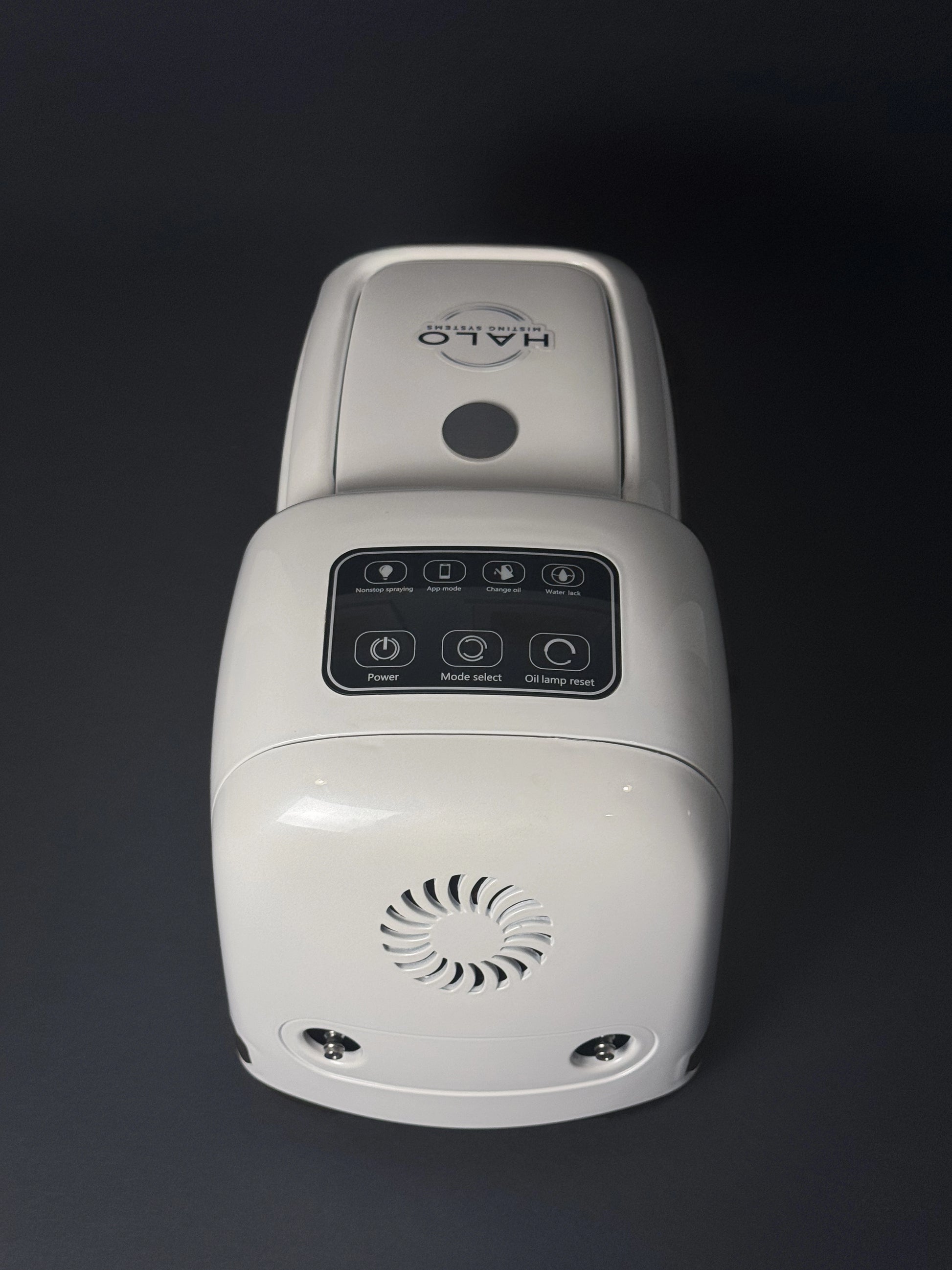 An above view of a high pressure 1000 PSI misting pump showing the control panel